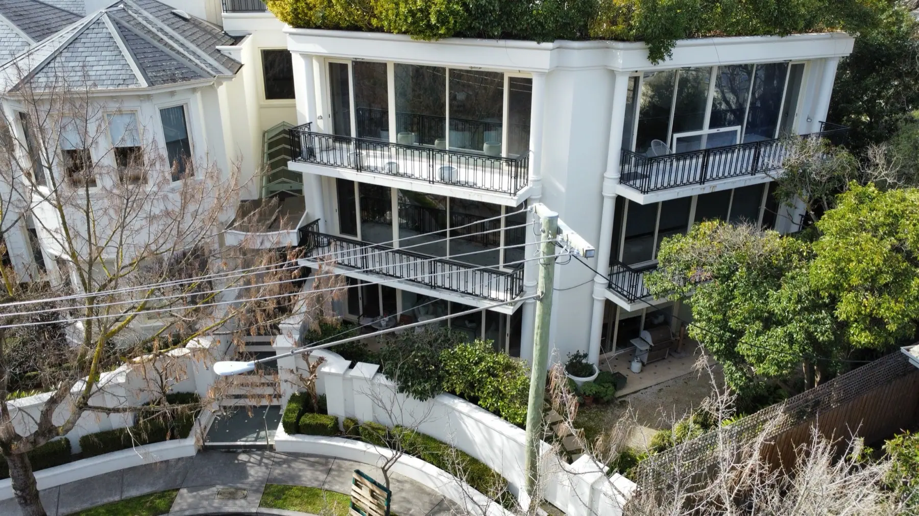 Completed exterior painting and window replacement at 2 Stanhope Court, South Yarra
