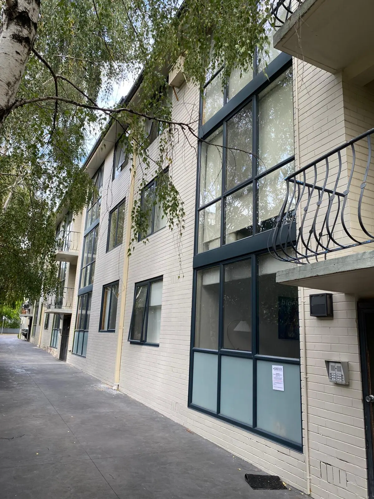 Completed external wall painting at 21 Irving Avenue, Prahran