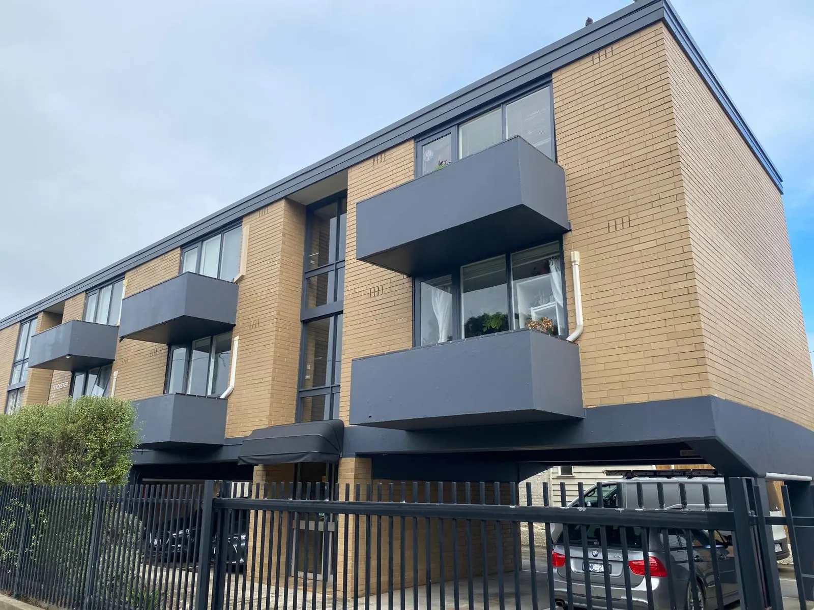 Completed painted balconies and windows at 24 Foote Street