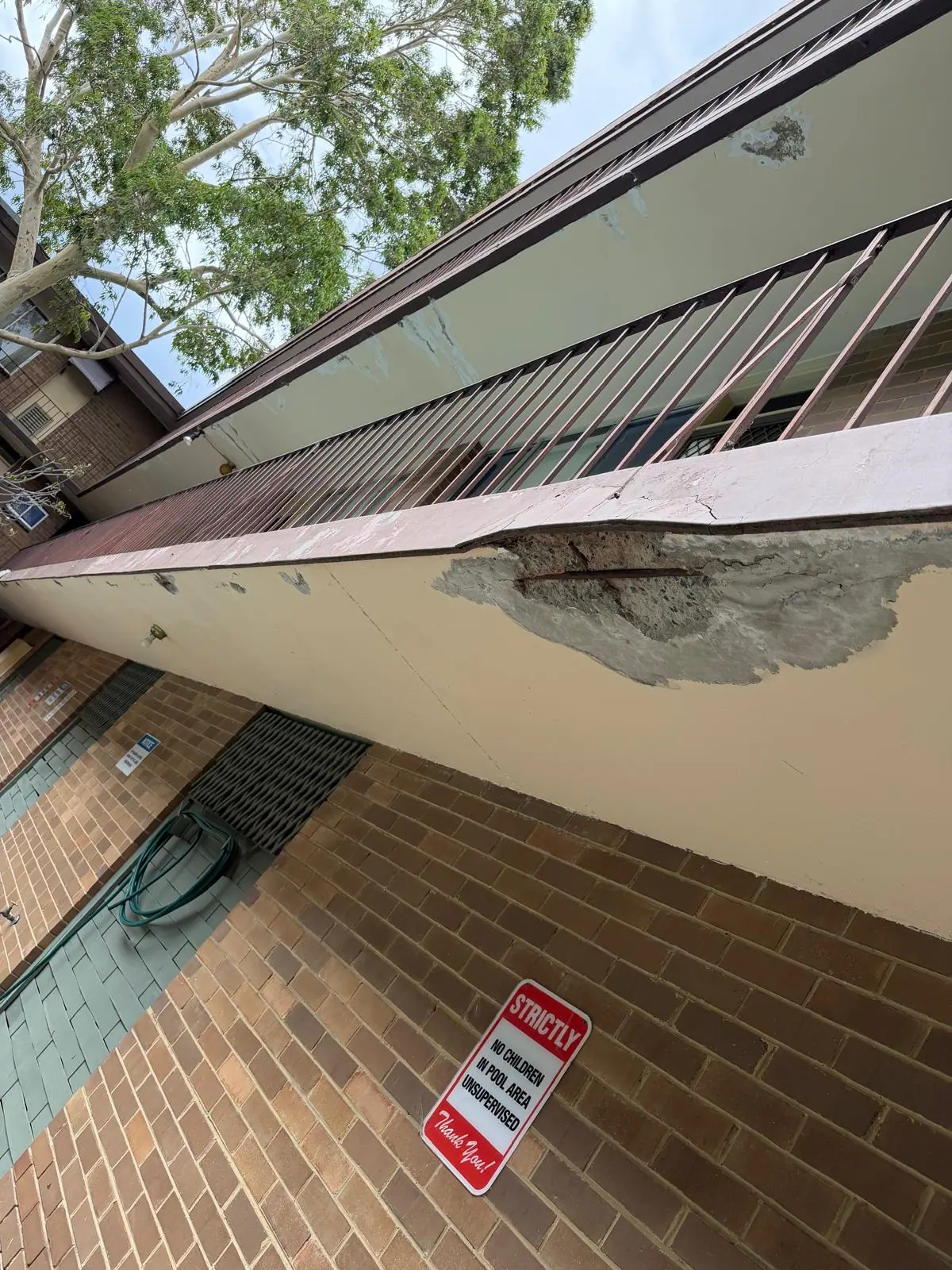 Concrete deterioration before repairs at 26 Lansdowne Road, photograph 11