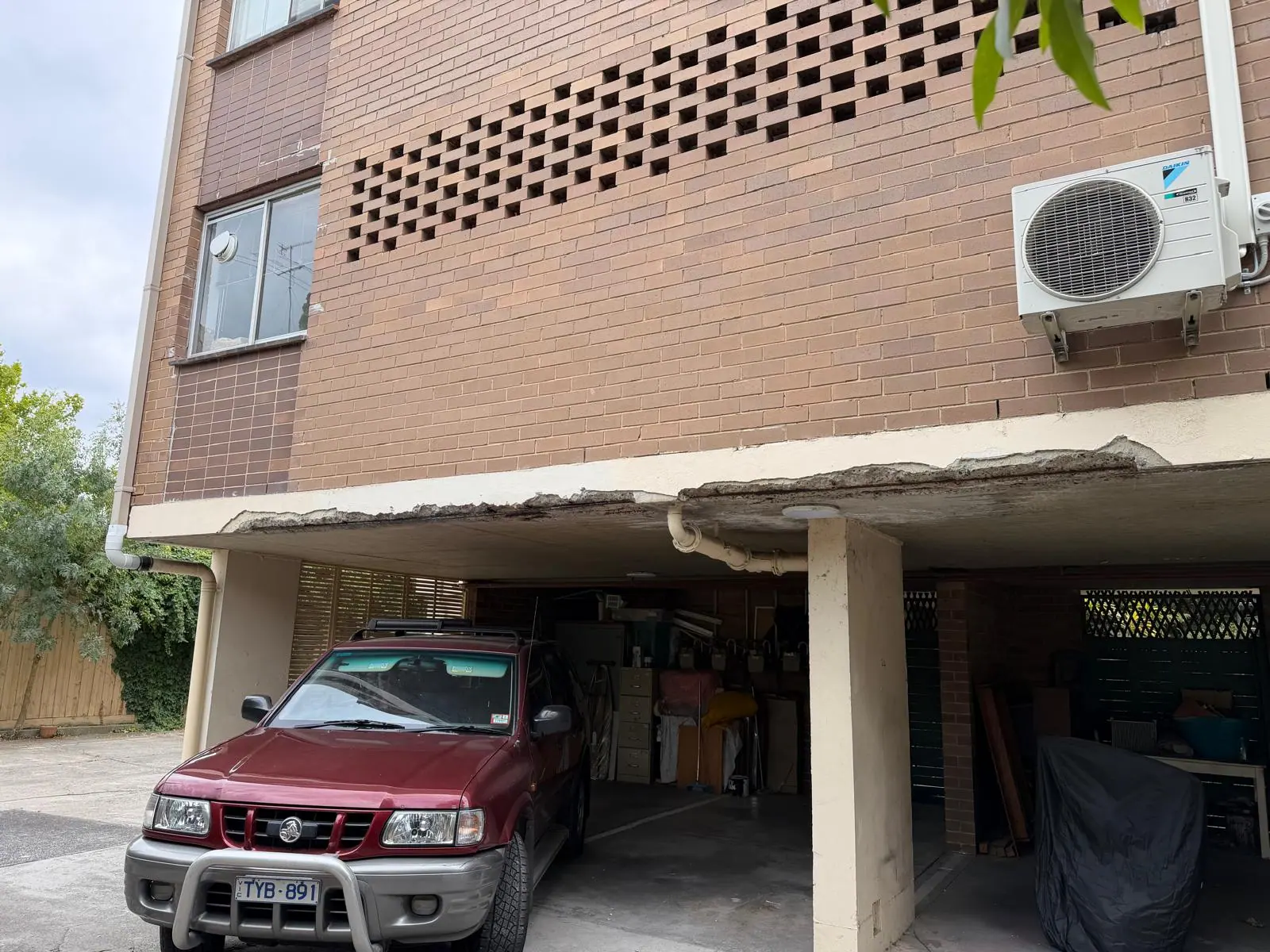 Concrete deterioration before repairs at 26 Lansdowne Road, photograph 6