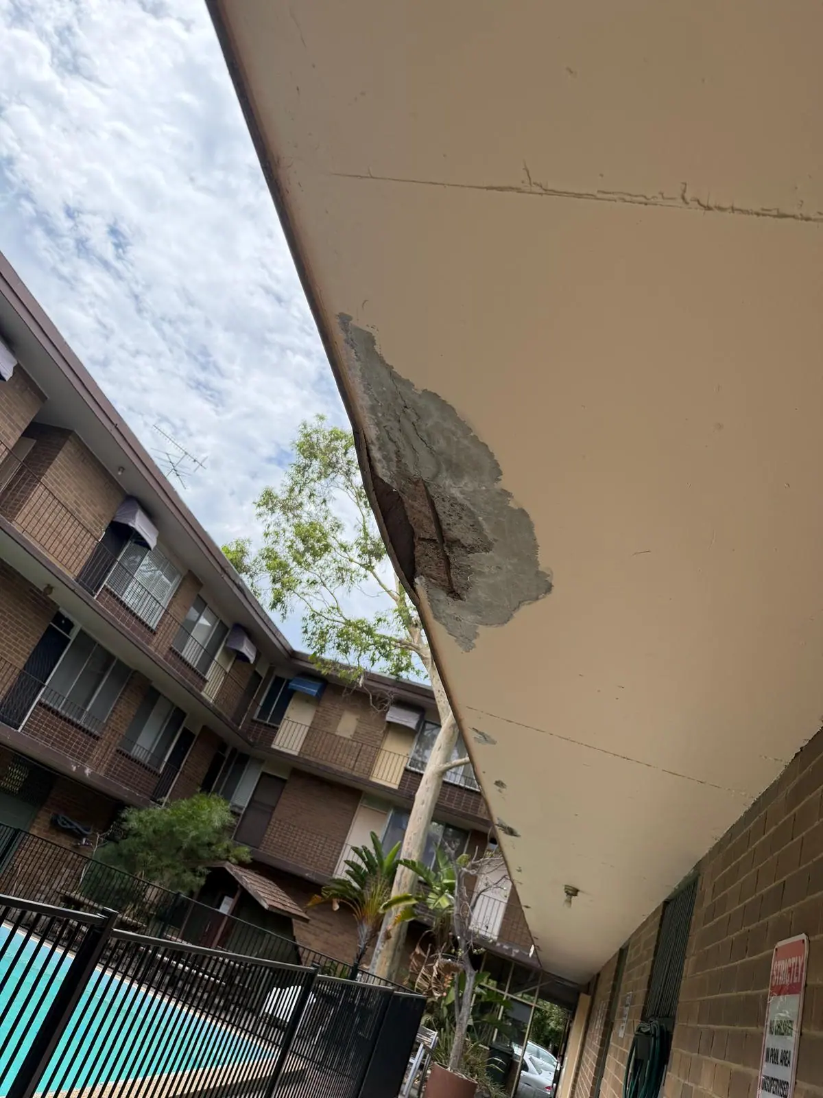 Concrete deterioration before repairs at 26 Lansdowne Road, photograph 8