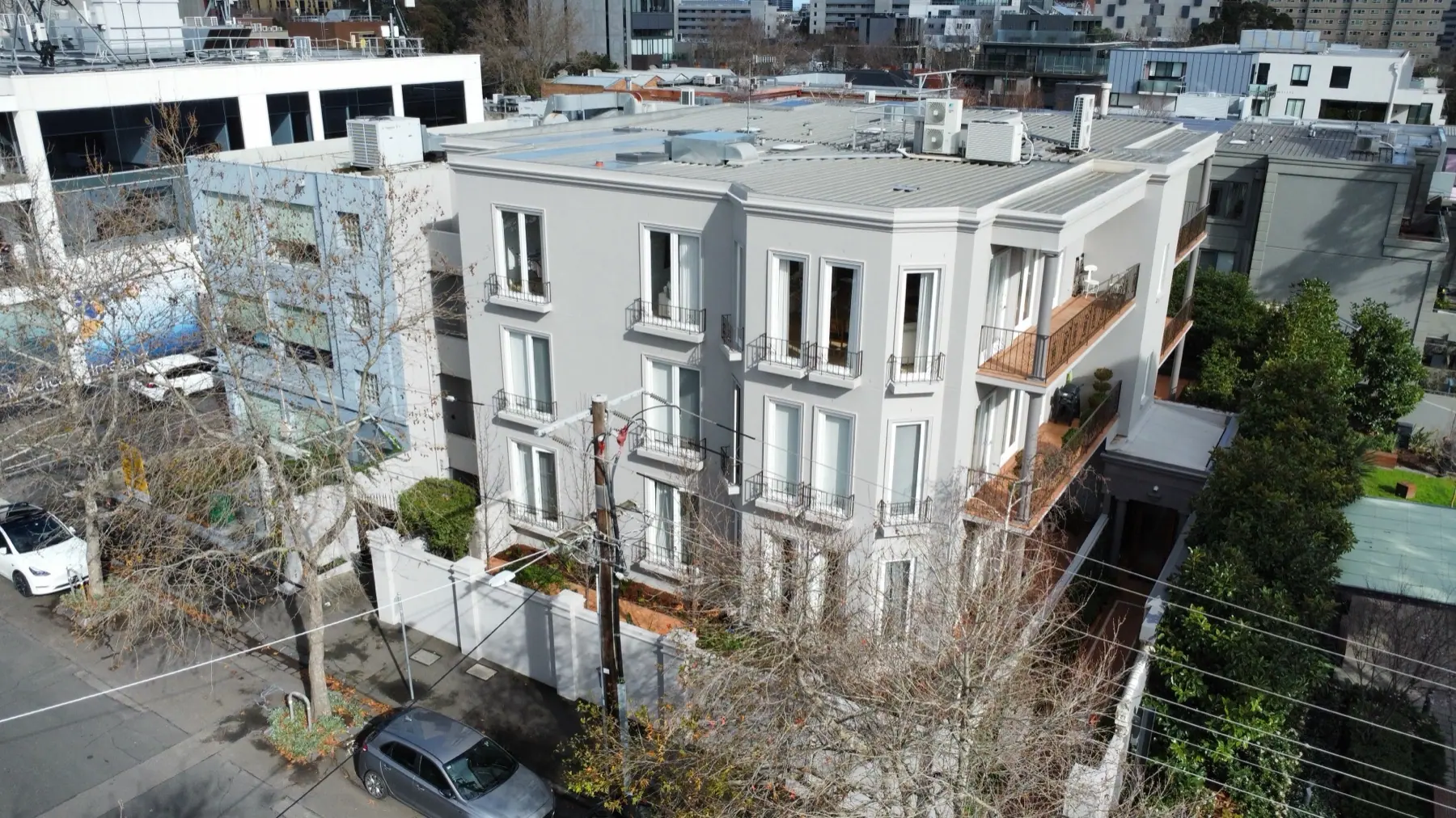 Completed painting and replacement windows on the Hobson Street apartment building
